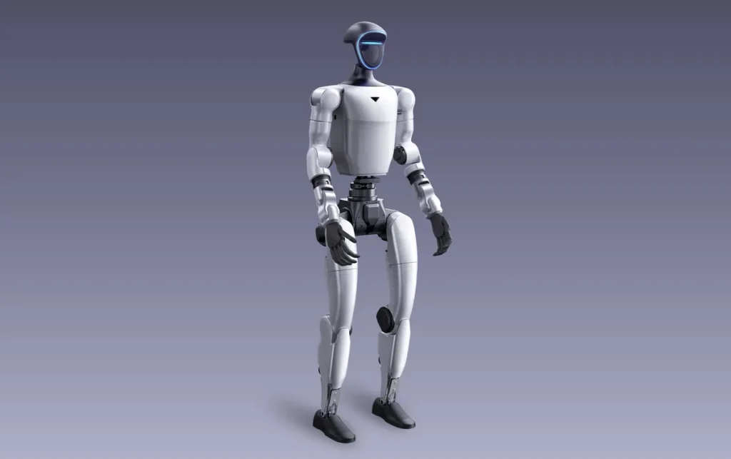 Vit och svart humanoid robot står upprätt mot gråblå bakgrund